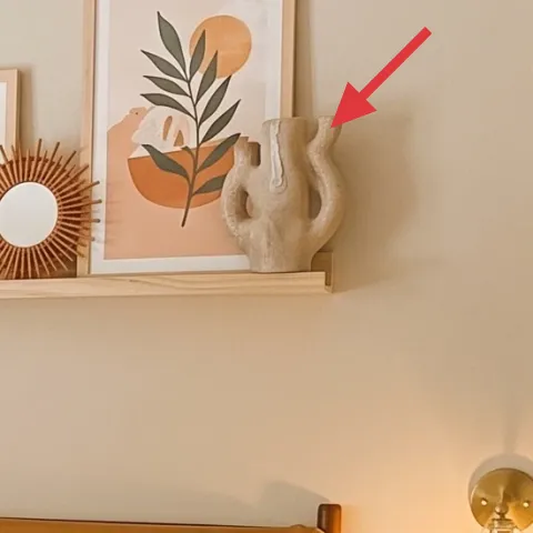 floating shelf styling (framed prints and decor)
