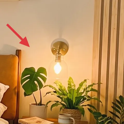 brass plug-in wall sconce (right side)