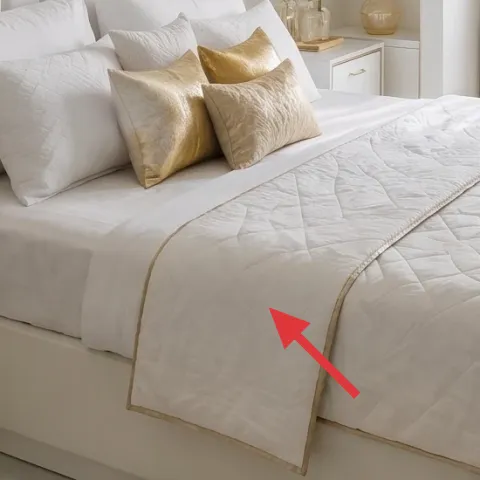 white quilted bedspread