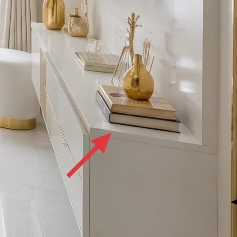 gold decorative tray on console