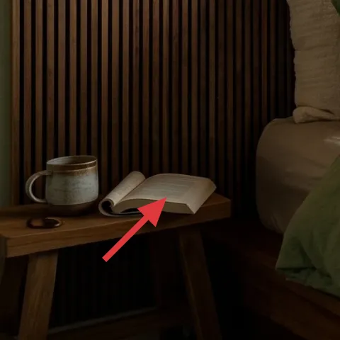 small candle jar on nightstand