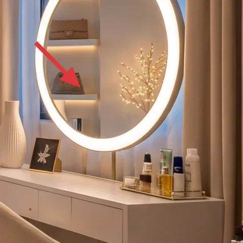round mirror with warm light ring